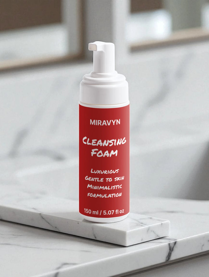 Miravyn cleansing foam bottle from the acne spot treatment box on a white marble surface.