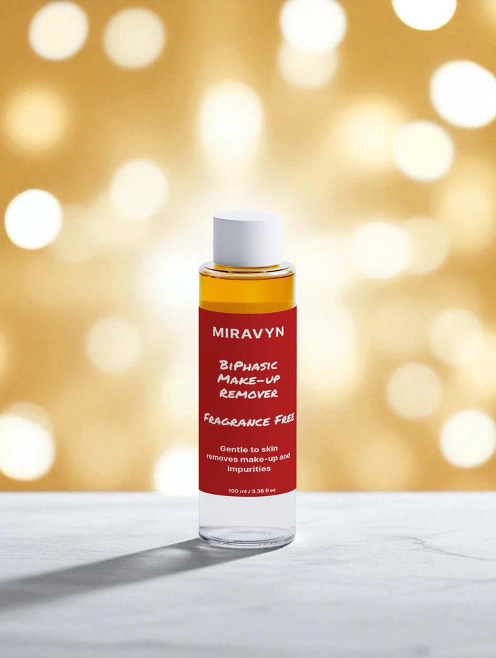 Miravyn aloe vera facial cleanser bottle with a red label on a blurred background.