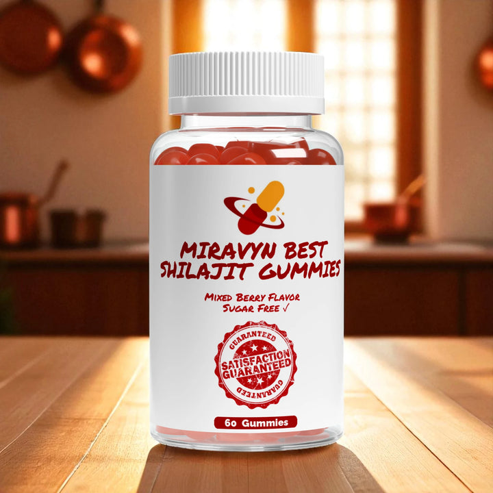 Bottle of Miravyn Best Shilajit Gummies on a wooden surface with a blurred kitchen background.