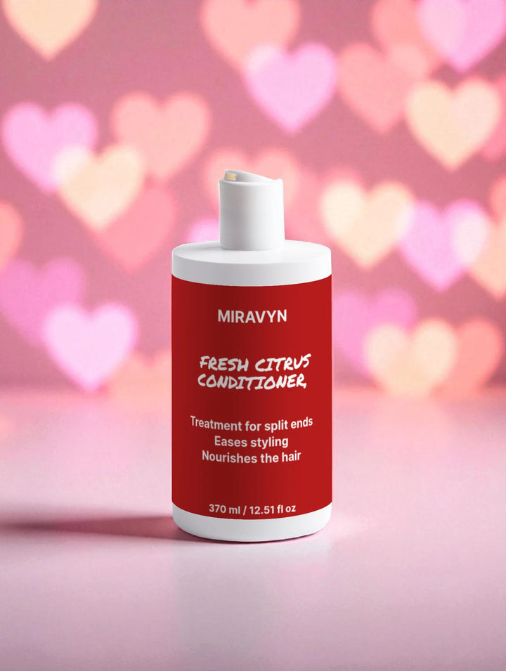 Miravyn Fresh Citrus Conditioner bottle with a pink heart-shaped background.