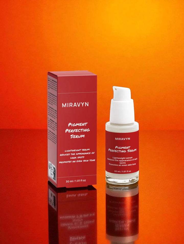 Miravyn dark spot correcting serum bundle on a golden background.