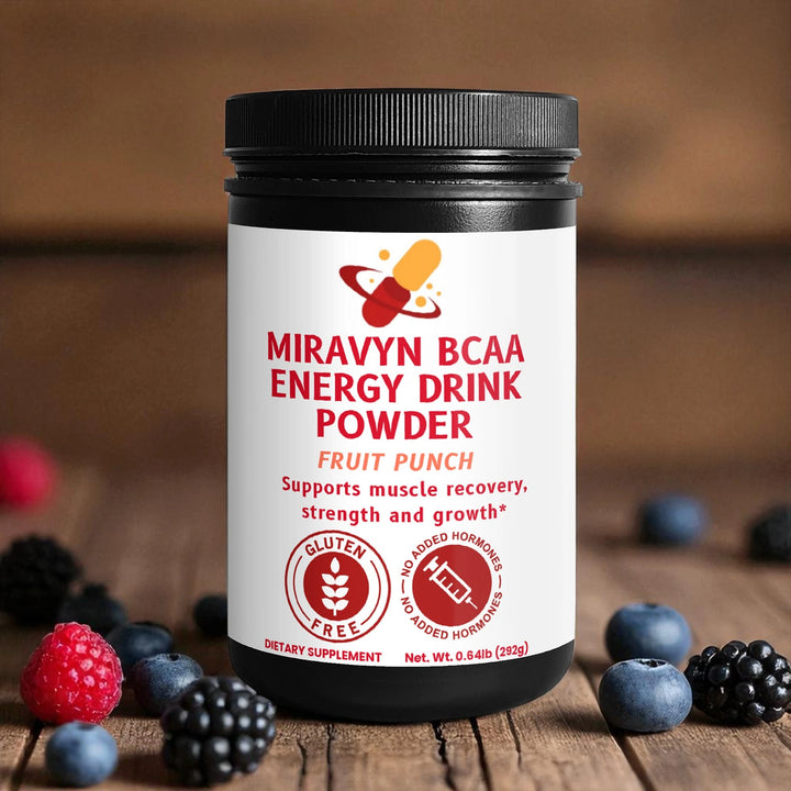 Jar of Miravyn BCAA Energy Drink Powder with fruit punch flavor on a wooden surface with berries.
