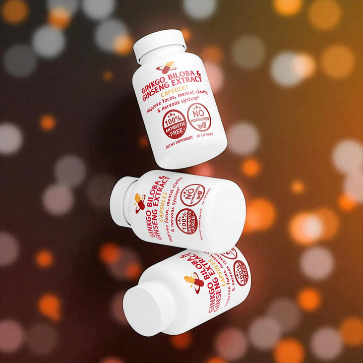 Three bottles of Ginkgo Biloba Ginseng Extract capsules on a blurred background with bokeh effect.