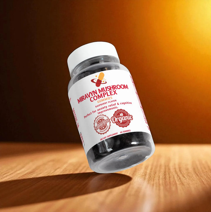 Bottle of Mirayvn Mushroom Complex nootropic gummies on a wooden surface with a warm background.