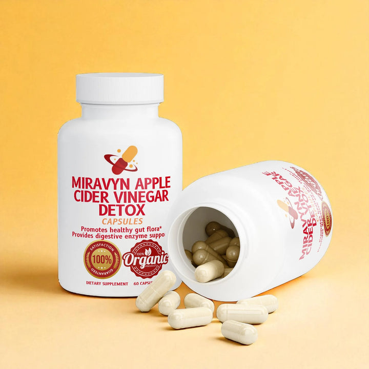 Miravyn Organic Apple Cider Vinegar Detox capsules with open bottle on a yellow background.