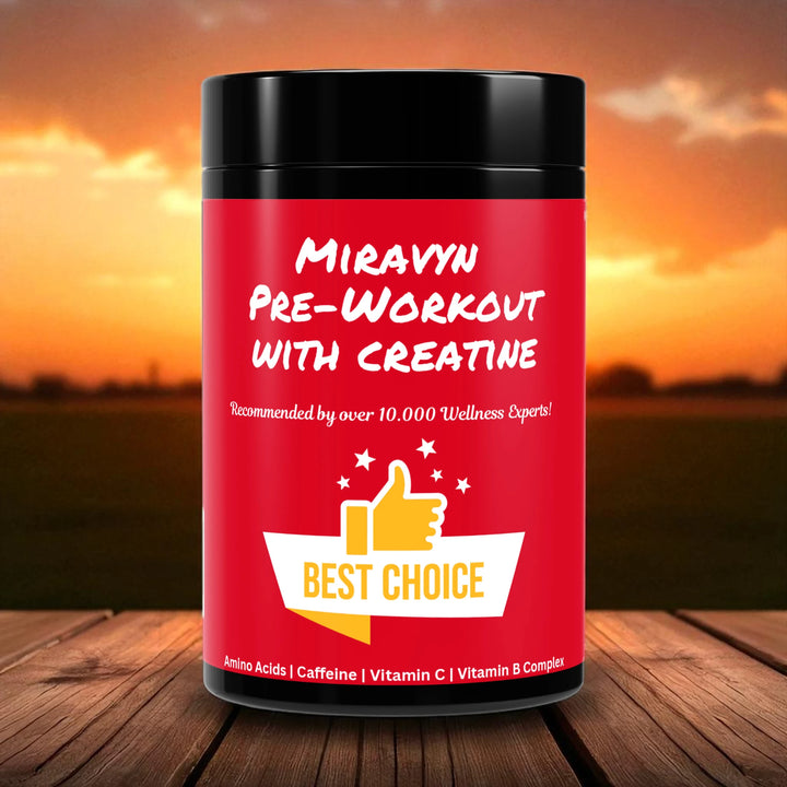 Red container of Miravyn Pre Workout with Creatine on a wooden surface with a sunset background.