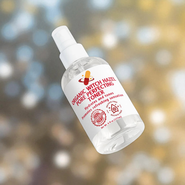 Bottle of Organic Witch Hazel Pore Minimizer Toner with a blurred nature background.