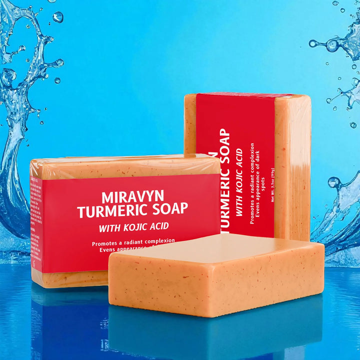 Miravyn Turmeric Soap with Kojic Acid on a blue background with water drops.
