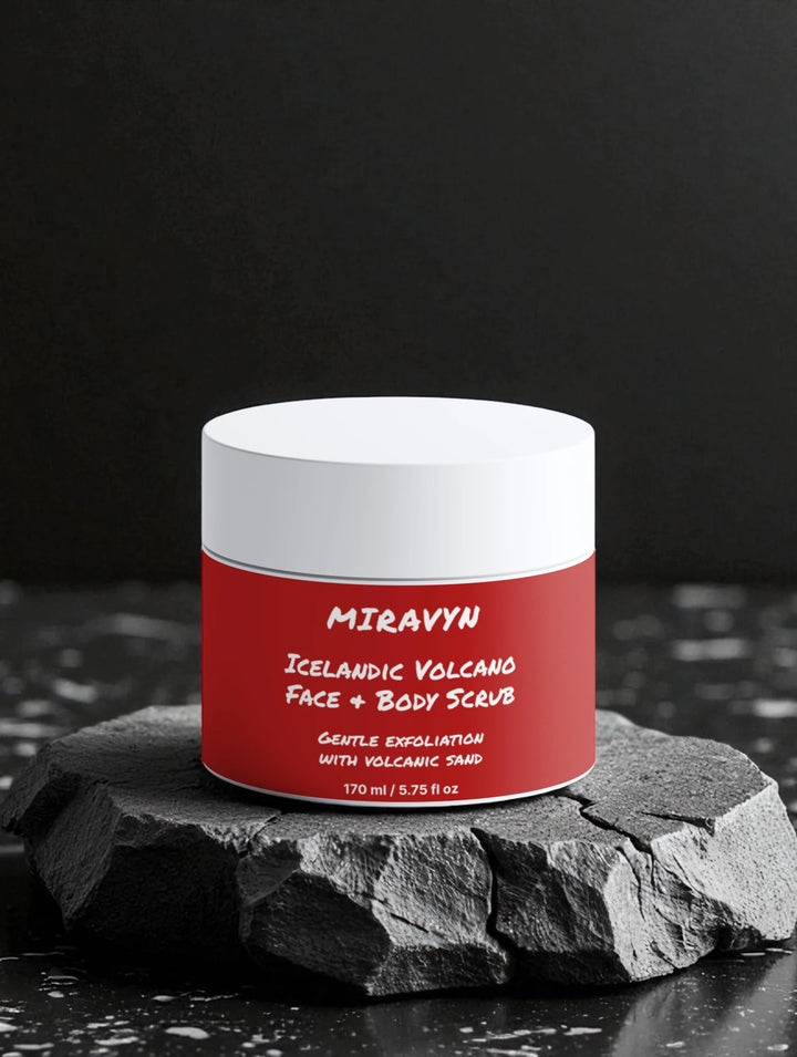 Jar of Miravyn Icelandic Volcano Ash Face Exfoliator and Body Scrub on a dark background.